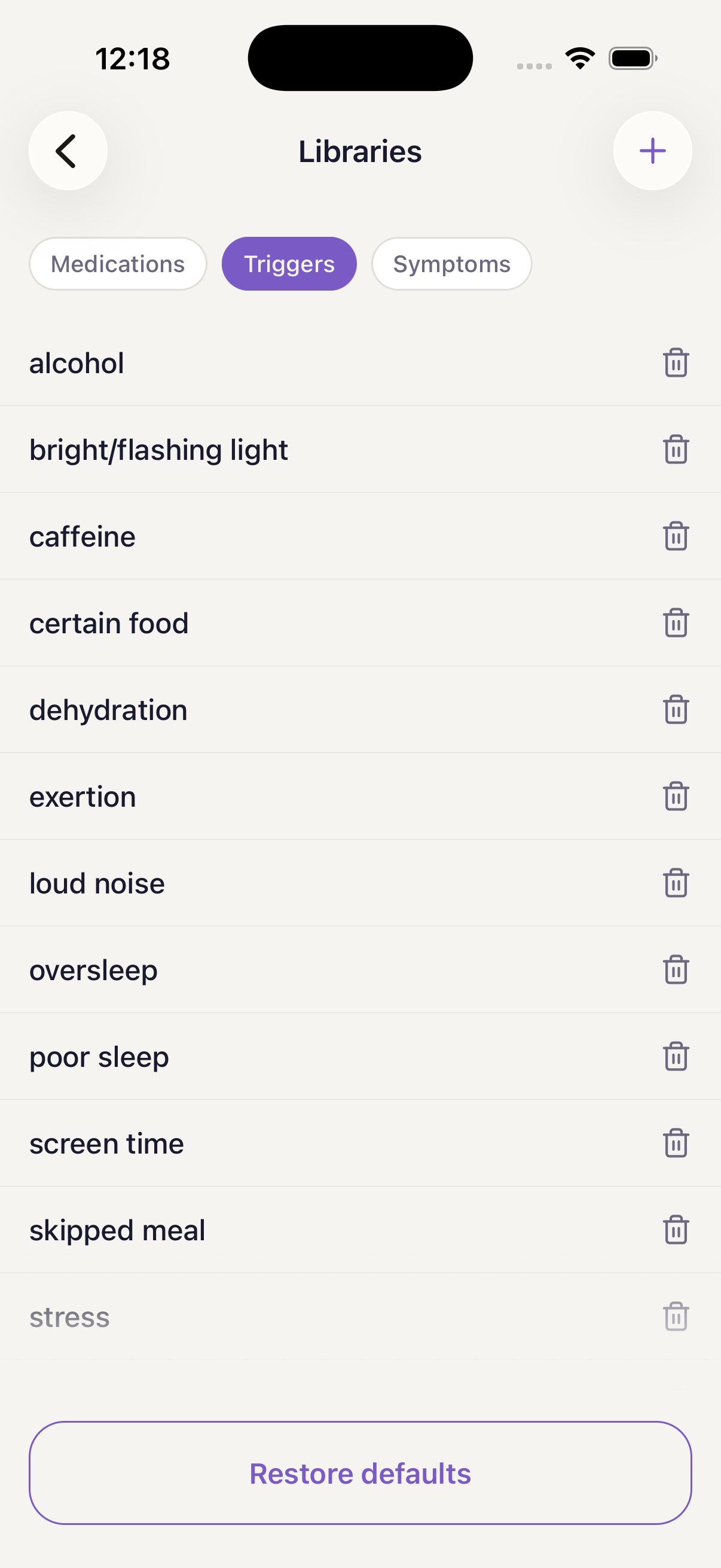 The library management screen, showing medications, triggers, and symptoms